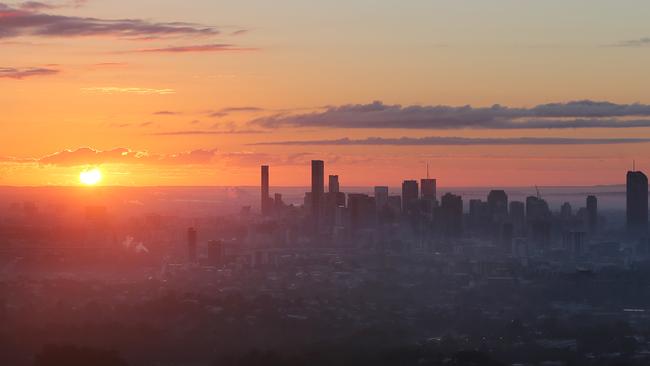 A 4.45am sunrise over the Brisbane CBD. Picture: Peter Wallis / News Corp