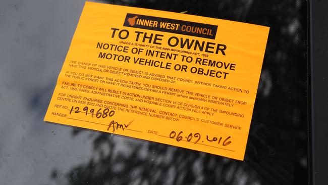Inner West Council rangers slapped a notice on a car that has been parked across Katrina Gulabovski’s St Peters’ driveway for six nights. Picture: Craig Wilson