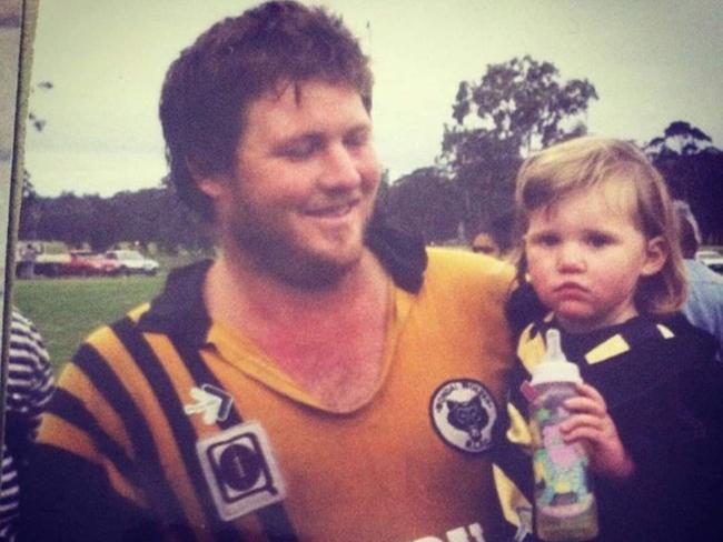 Scott and Brittany Holding in 1998 after Mr Holding won a grand final for Wondai.