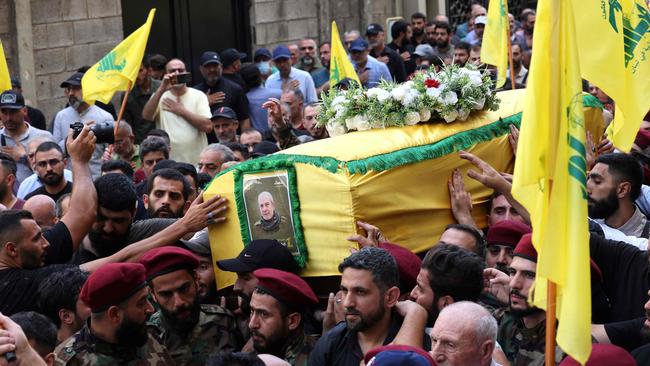 People take part in the funeral of Hezbollah Military Commander Mohammed Naameh Nasser after he was killed by an Israeli strike. Picture: AFP.