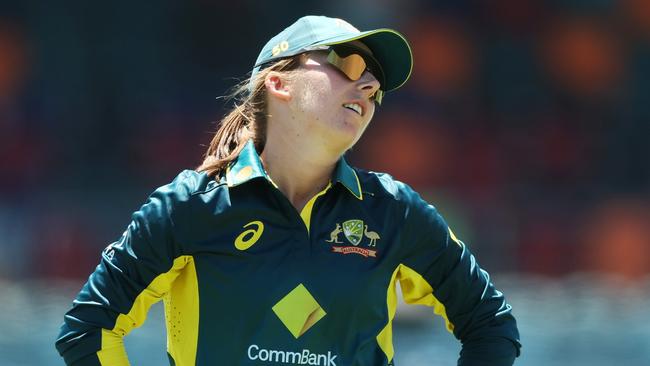 CANBERRA, AUSTRALIA - JANUARY 28:  Georgia Wareham of Australia reacts after an attempted catch during game two of the Women's T20 International series between Australia and South Africa at Manuka Oval on January 28, 2024 in Canberra, Australia. (Photo by Mark Metcalfe/Getty Images)