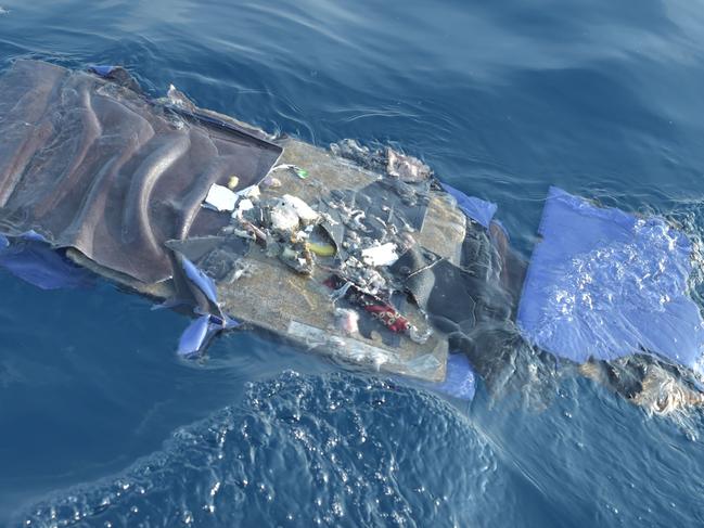 Debris from the ill-fated flight washes up. Picture: Adek Berry/AFP