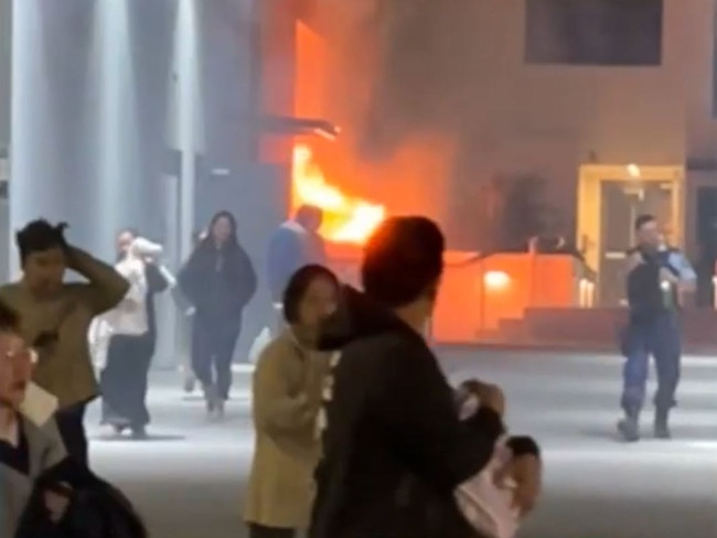 Hundreds of people were evacuated from a unit complex in western Sydney early this morning after a car fire., The blaze erupted next to the complex on Gladstone Street, Merrylands, at about 2.45am., About 250 people were evacuated from the building as a precaution. Picture: 9NEWS