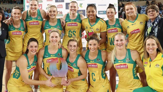 Winners are grinners. The Diamonds after their win in the Quad series.