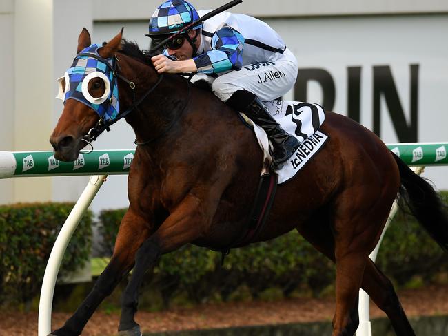 John Allen pilots Kenedna home in the Doomben Cup. Picture: AAP