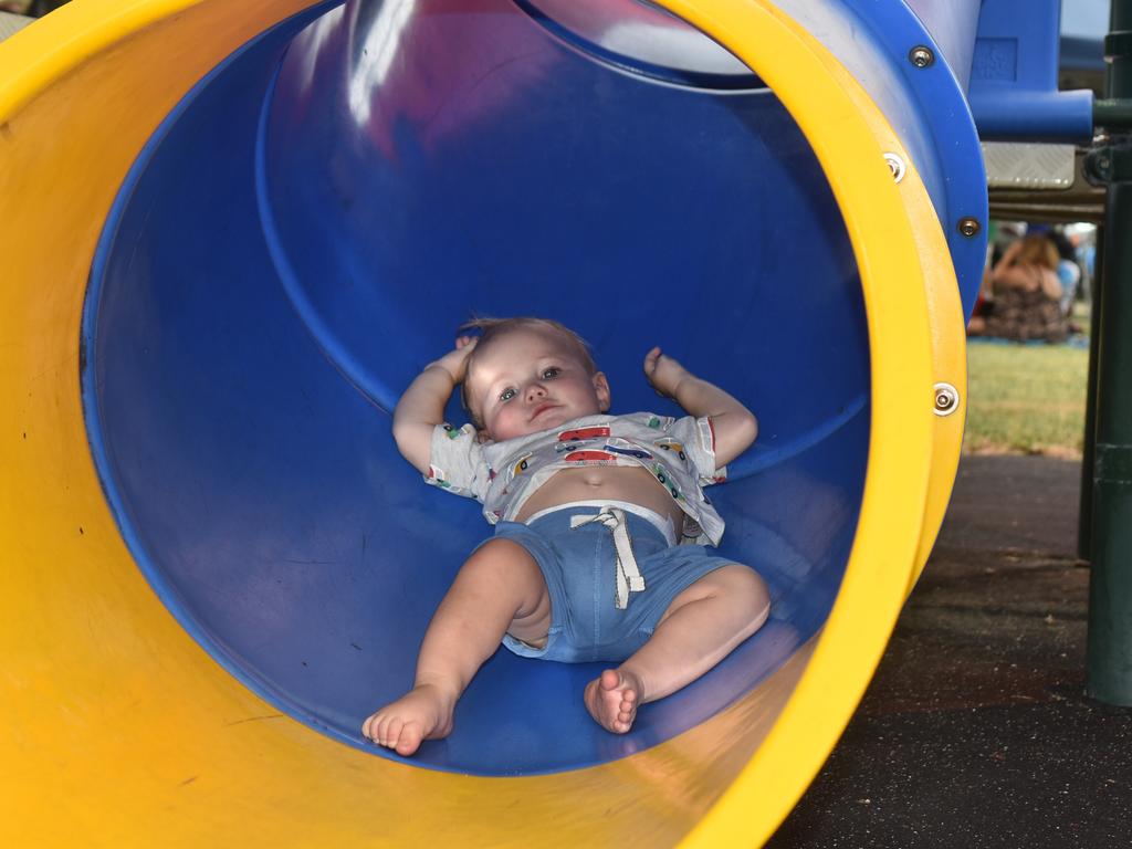 Isaiah Marsters hanging out on the slide at Australia Day celebrations in Quote Park on January 26, 2022. Picture: Lillian Watkins