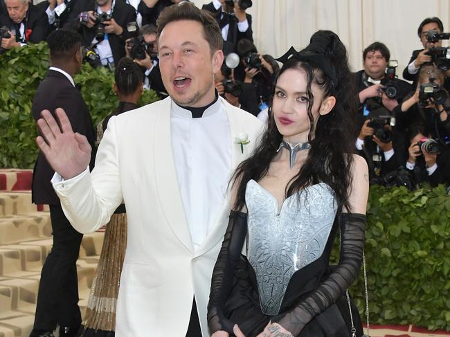 NEW YORK, NY - MAY 07:  Elon Musk and Grimes attend the Heavenly Bodies: Fashion & The Catholic Imagination Costume Institute Gala at The Metropolitan Museum of Art on May 7, 2018 in New York City.  (Photo by Neilson Barnard/Getty Images)