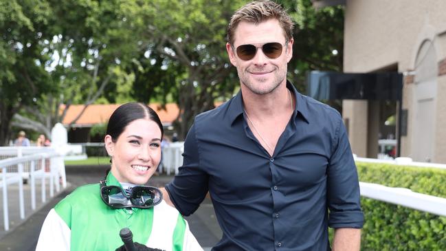 Superstar actor Chris Hemsworth congratulates young jockey Courtney Bellamy on her first Saturday winner at Eagle Farm. Picture: Supplied,