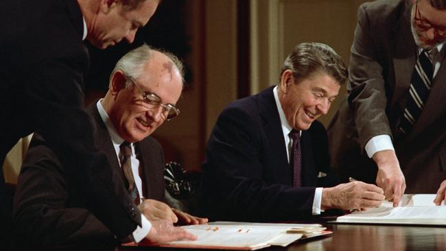 Former US president Ronald Reagan and Soviet Union leader Mikhail Gorbachev sign the arms control agreement banning the use of intermediate-range nuclear missiles in 1987.