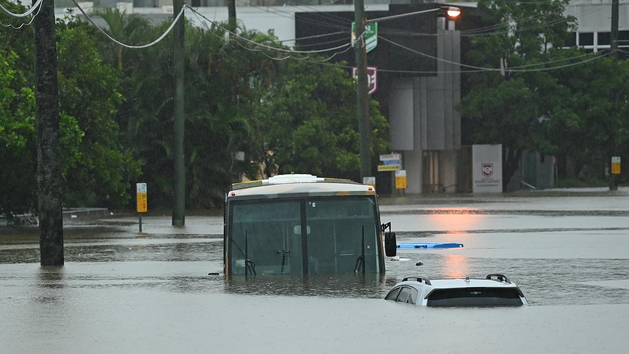 A bus underwater near Suncorp stadium in Milton in 2022. The Lord Mayor says buses resumed today only where safe. Picture: Lyndon Mechielsen/The Australian