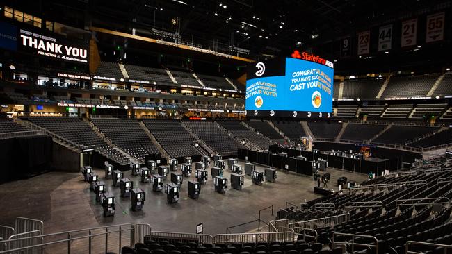 Booths set up for voting in State Farm Arena, Georgia's largest early voting location. Picture: AFP