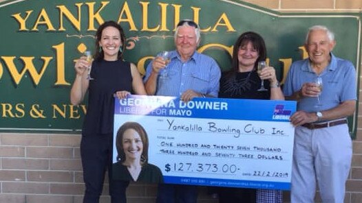 CHEQUE IT OUT: Georgina Downer — Liberal for Mayo giving a novelty cheque to the Yankalilla Bowling club. Picture: Georgina Downer — Liberal for Mayo/Facebook