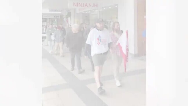 Wagga PSA members marching on Baylor Street towards the Union Club Hotel Wagga