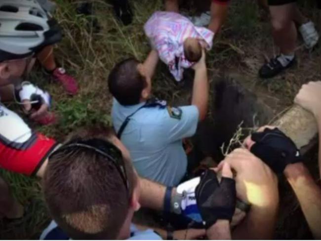 The dramatic moment a baby was rescued from a drain in Quakers Hill.