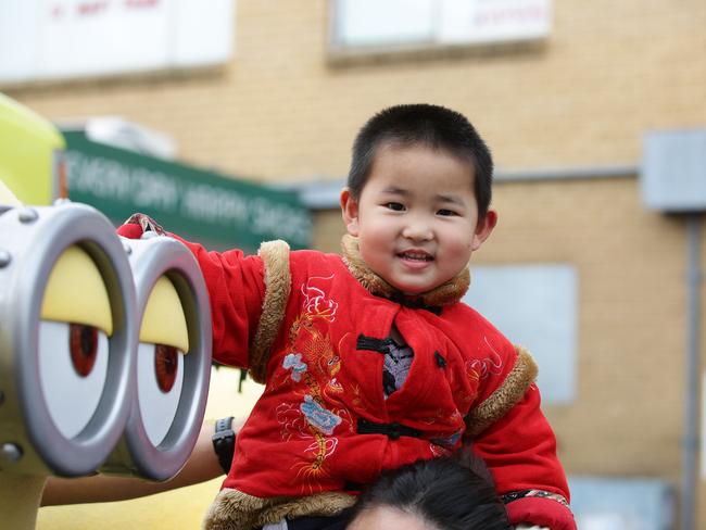 Ryan Guo meets a minion at the Cabramatta Moon Festival.