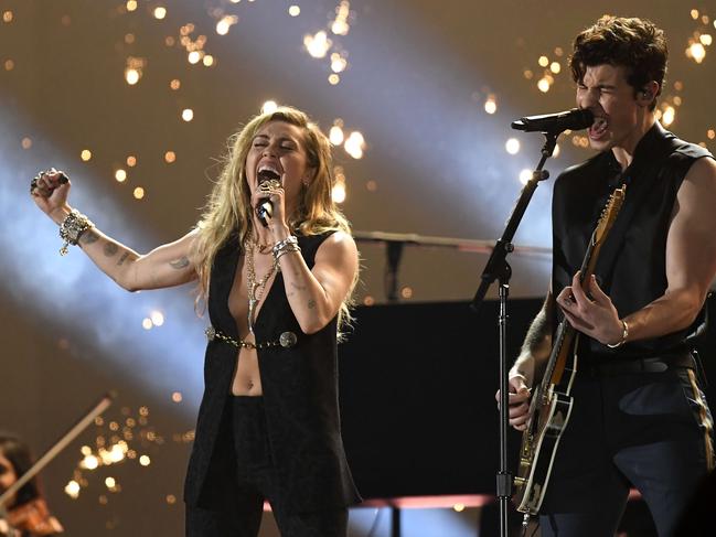 Miley Cyrus and Shawn Mendes perform onstage. Picture: Getty