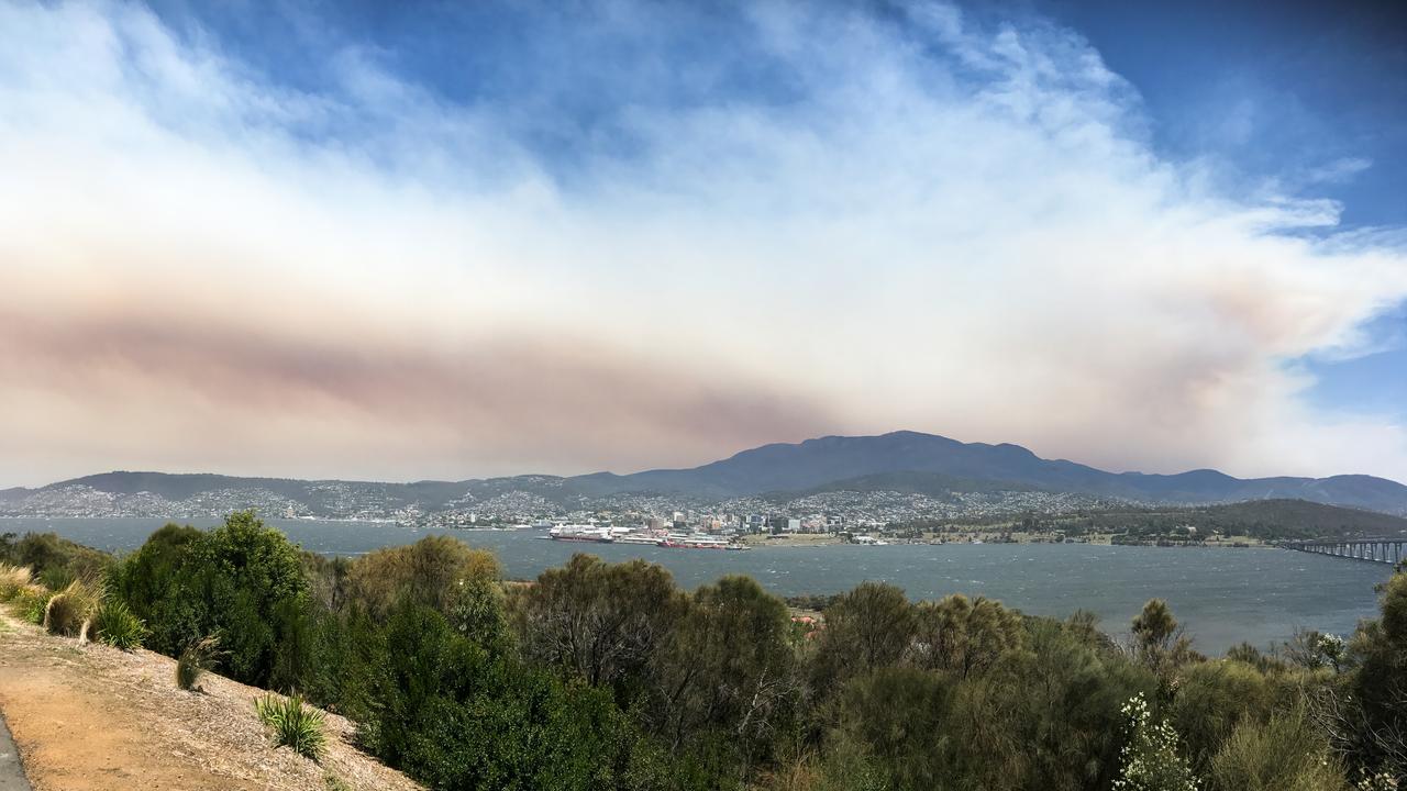 Smoke from an out-of-control bushfire Wilderness World Heritage area in southwest Tasmania. Picture: AAP/ Ethan James