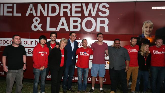 Premier Daniel Andrews with some of the ‘red shirt’ volunteer brigade.