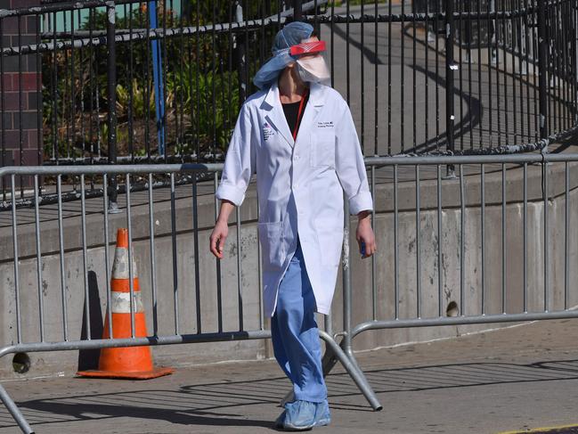 A physician is seen outside at Elmhurst Hospital Centere in the Queens borough of New York. Picture: AFP