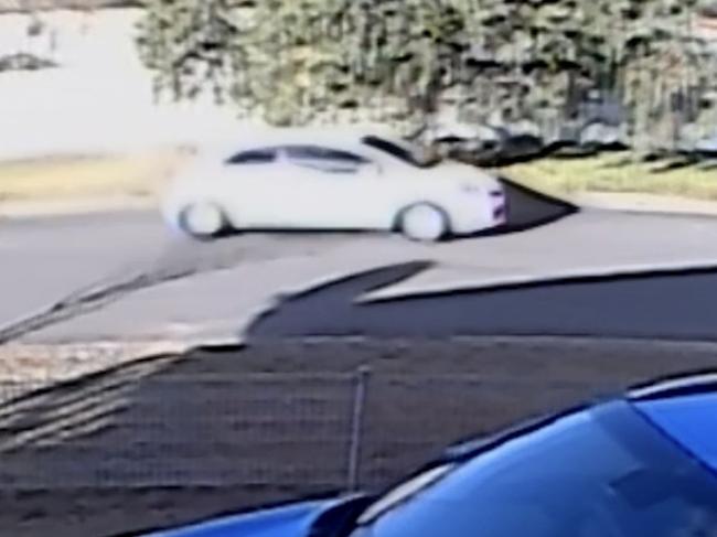 Police have released CCTV of two men seen on CCTV leaving the Toyota Aurien in Smithfield and getting into a white Toyota Yaris. Picture: NSW Police