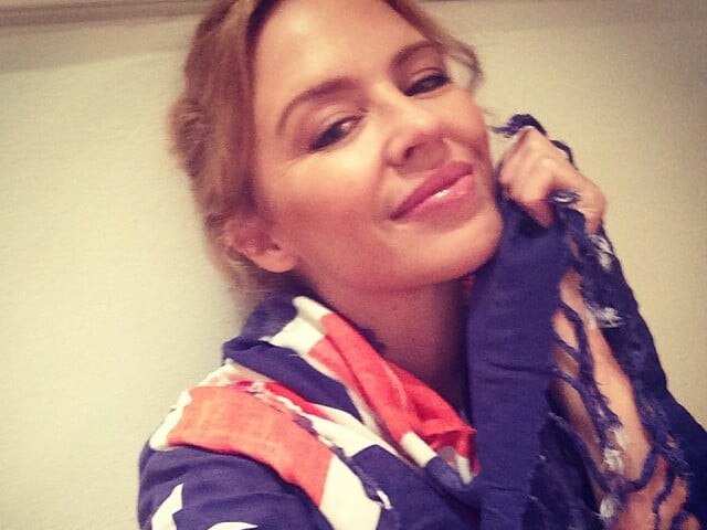 Kylie Minogue wrapped herself in an Australian flag. Picture: @kylieminogue/Instagram