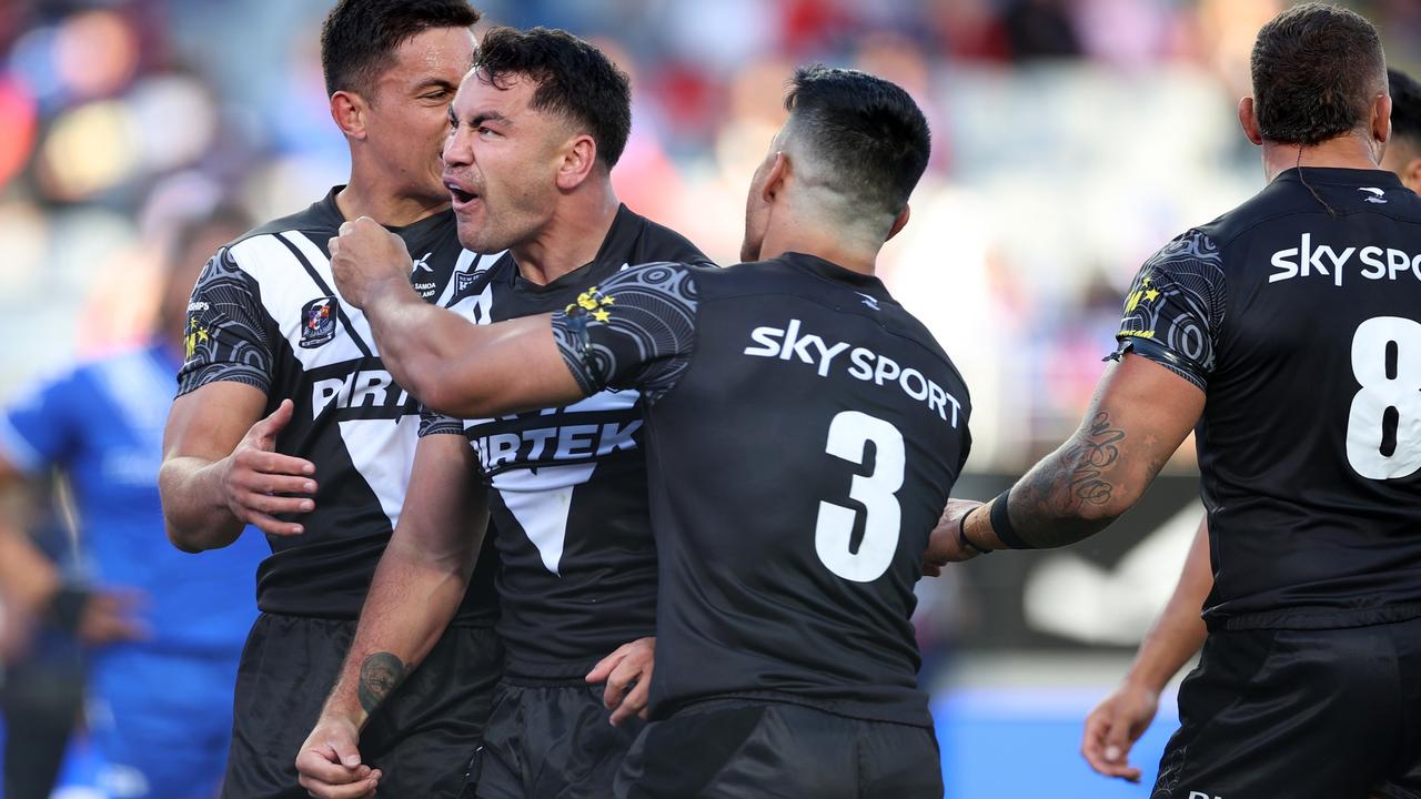 AUCKLAND, NEW ZEALAND - OCTOBER 21: Jahrome Hughes of the Kiwis scores a try during the Mens Pacific Championships match between New Zealand Kiwis and Toa Samoa at Eden Park on October 21, 2023 in Auckland, New Zealand. (Photo by Fiona Goodall/Getty Images)