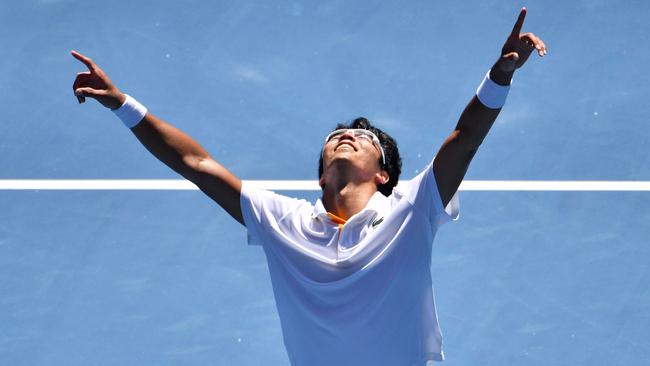 South Korea's Hyeon Chung soaks in a historic win. Picture: AFP