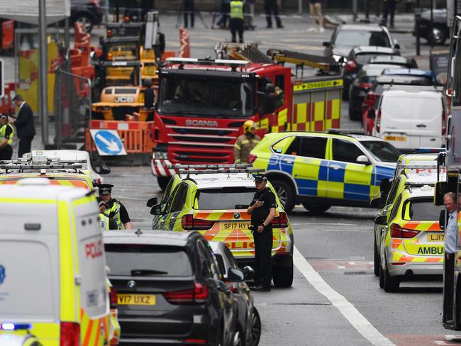 Emergency services at the scene after reports of three people being killed in a central Glasgow hotel. Picture: Getty