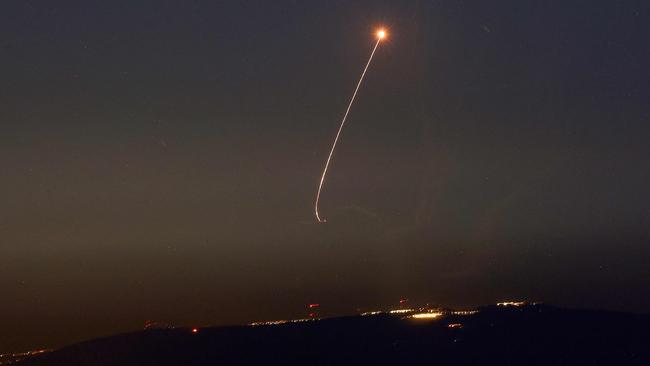 Rockets fired from southern Lebanon are intercepted by Israel's Iron Dome air defence system over the Upper Galilee region in northern Israel. Picture Jalaa Marey / AFP)