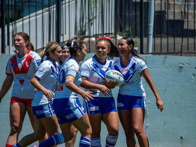 The Bulldogs celebrate a try. Picture: Thomas Lisson