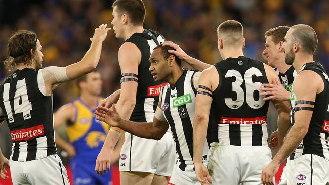 Pies swarm Travis Varcoe after his superb qualifying final goal against West Coast. Pic: Getty Images