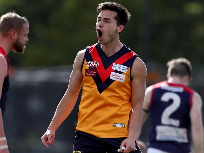 Ben Caluzzi celebrates a goal for East Keilor. Picture: Mark Dadswell