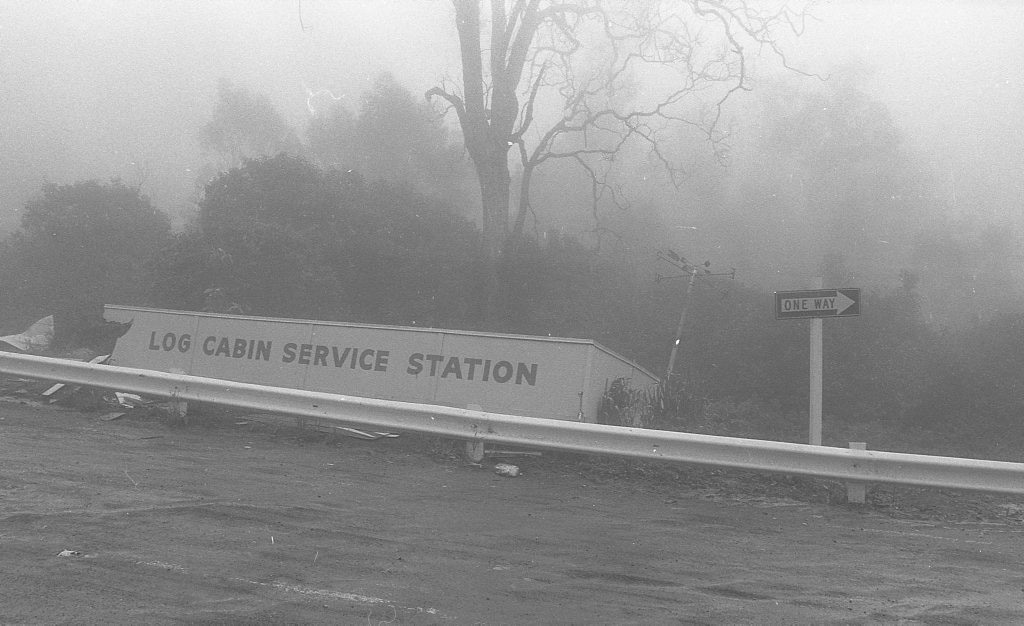 Historic: Toowoomba: Accidents: Clean up at the Log Cabin Service Station the morning after a semi-trailer rolled and crashed in the building removing most of the front of the station. The owner in 1978, Mr Neville Hammond started rebuilding immediately. Photo: Bruce Mackenzie / The Chronicle Neg: U875. Picture: Bruce Mackenzie