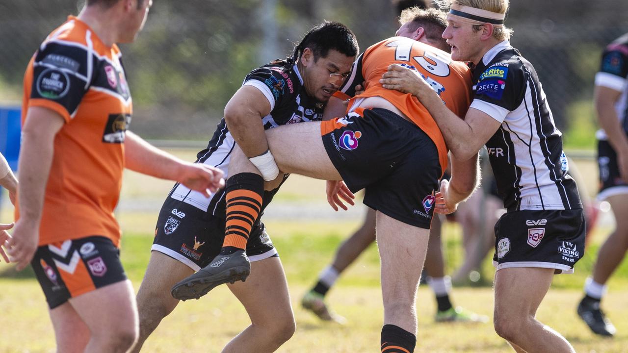 AJ Ma Chong (left) of Oakey tackles Mitchell Murphy. Picture: Kevin Farmer