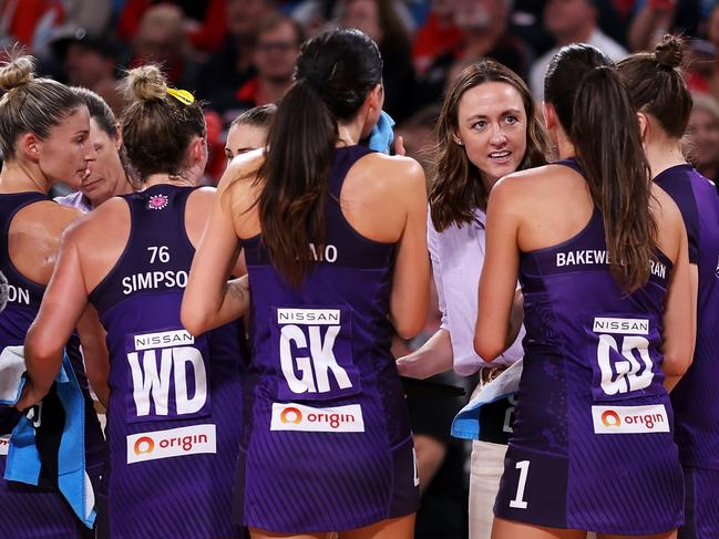 SYDNEY, AUSTRALIA - APRIL 01:  Head Coach Bec Bulley of the Firebirds talks to her players during a time outduring the round three Super Netball match between NSW Swifts and Queensland Firebirds at Ken Rosewall Arena, on April 01, 2023, in Sydney, Australia. (Photo by May Bailey/Getty Images)