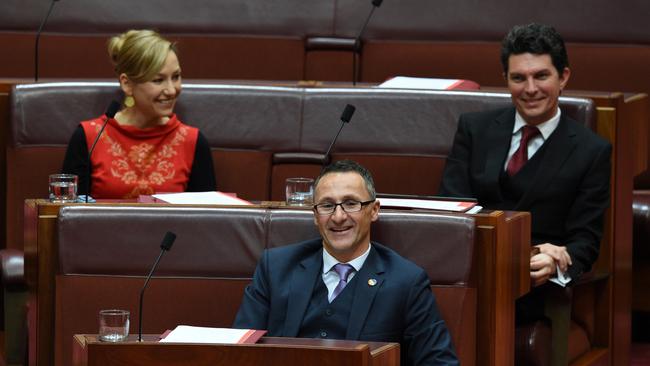 Greens leader Richard Di Natale, centre, with former deputy leaders Larrisa Waters (left) and Scott Ludlum who both were forced to quit during the winter break over the dual citizenship bungle.