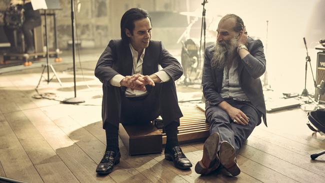 Australian musicians Nick Cave (left) and Warren Ellis in London in March 2021, during a break in performance for the Andrew Dominik film This Much I Know To Be True, released in 2022. Picture: Supplied / Bad Seed Ltd