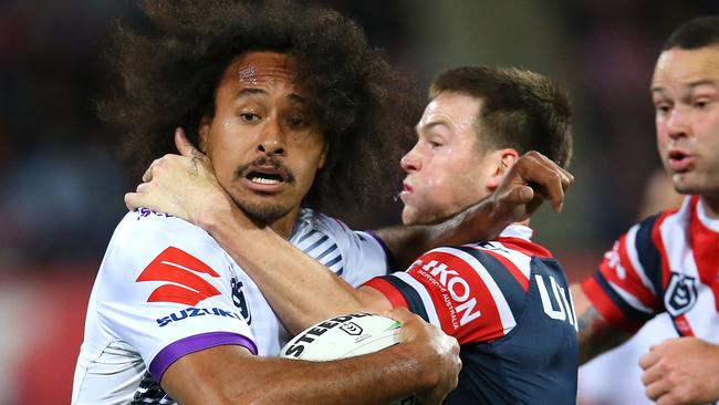 Keary gets to grips with Kaufusi. Photo: Jason McCawley/Getty Images