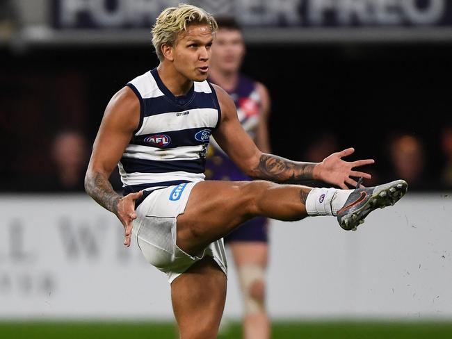 PERTH, AUSTRALIA - JULY 15: Quinton Narkle of the Cats kicks on goal during the 2021 AFL Round 18 match between the Fremantle Dockers and the Geelong Cats at Optus Stadium on July 15, 2021 in Perth, Australia. (Photo by Daniel Carson/AFL Photos via Getty Images)