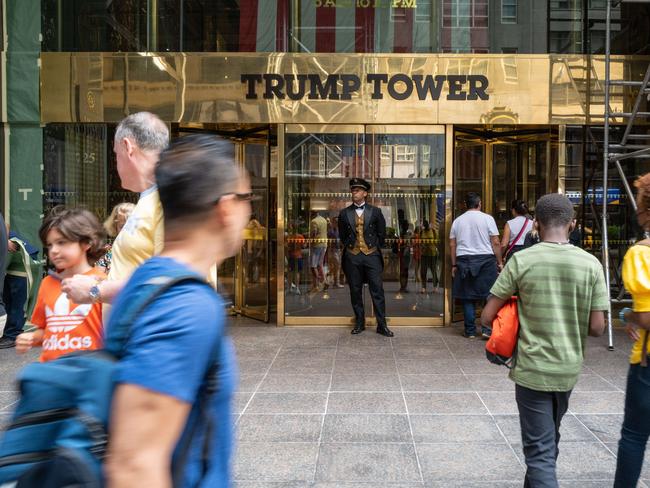 People walk by Trump Tower in New York City. According to a recent report, the FBI was looking for nuclear-related documents among other things when they searched Mar-a-Lago. Picture: Getty Images/AFP