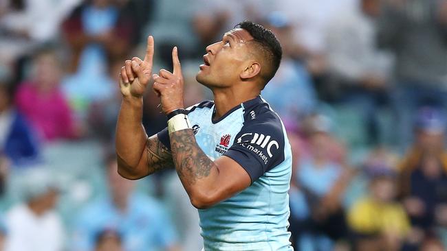 Israel Folau looks to the heavens after scoring a try for the Waratahs. Picture: Getty Images