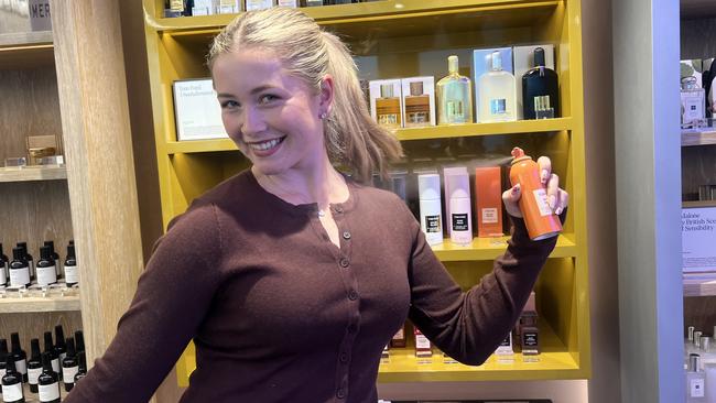 Trudi Day, 23, of Mt Compass, was the first customer in line at the new MECCA at Burnside Village. Picture: Anna Vlach