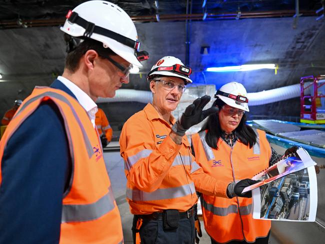 Queensland State Development and Infrastructure Minister Grace Grace and Transport Minister Bart Mellish (left) are given an update by Graeme Newton, the CEO of the Cross River Rail Delivery Authority. Picture: Dan Peled