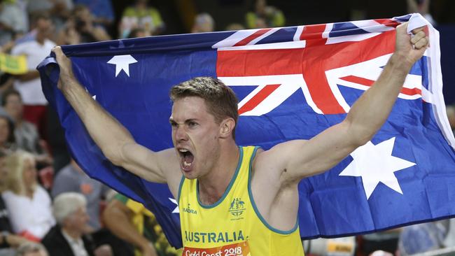 Nick Hough celebrates his bronze medal