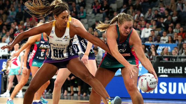 Kim Commane takes on Geva Mentor during the  Melbourne Vixens v Sunshine Coast Lightning clash last week Picture: Mark Dadswell