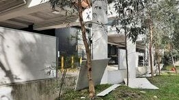 Damaged fence panels at the Glenrose Shopping Village at Belrose. Picture: David Buchanan