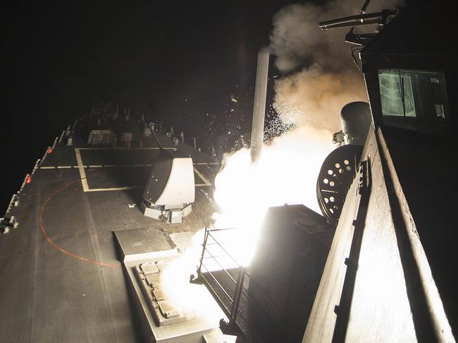 In this image released by the US Navy, the USS Ross fires a tomahawk land attack missile at a Syrian air force airfield . Picture:  AFP