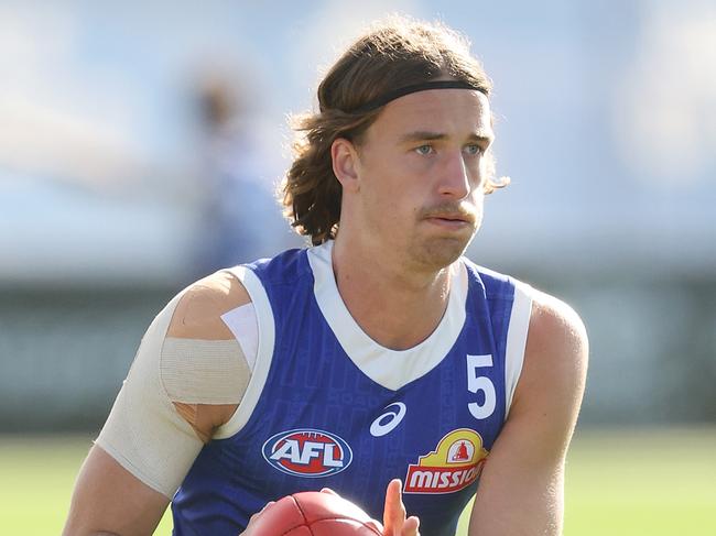 MELBOURNE, AUSTRALIA - MARCH 20: Jedd Busslinger of the Bulldogs in action during a Western Bulldogs AFL training session at Whitten Oval on March 20, 2024 in Melbourne, Australia. (Photo by Daniel Pockett/Getty Images)