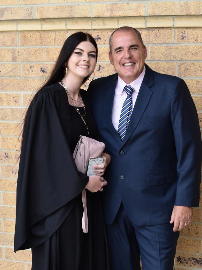 Alesia pictured at her high school graduation in 2019 with youth worker and mentor Tony Pond.