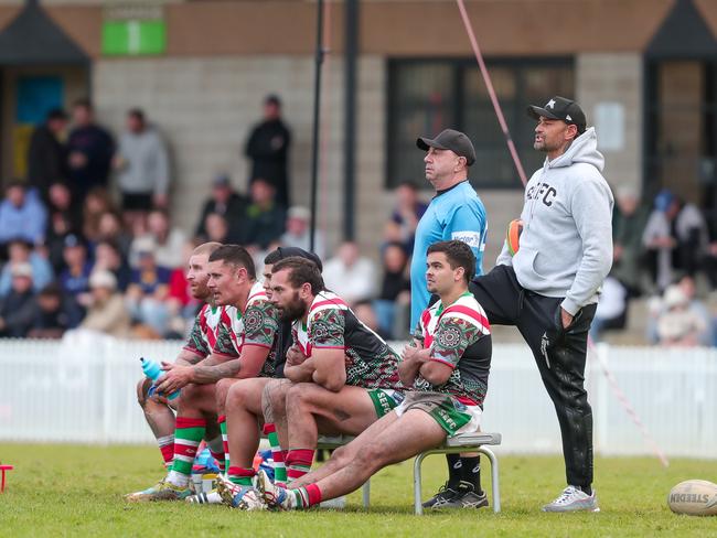 John Sutton and the bench watch on with victory all but assured with just a few minutes left on the clock. Picture: Adam Wrightson Photography